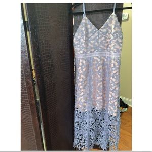 Periwinkle lace dress with nude fabric underlay